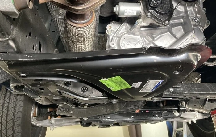 Ford transfer case skid installed on Base Bronco (with part numbers)