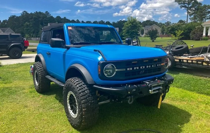 Monstaliner Grabber Blue bed liner coating applied to Bronco exterior