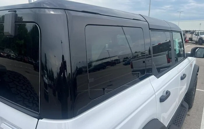 Black Painted Hard top (+ Raptor style running boards) on 2024 Bronco at our dealership!